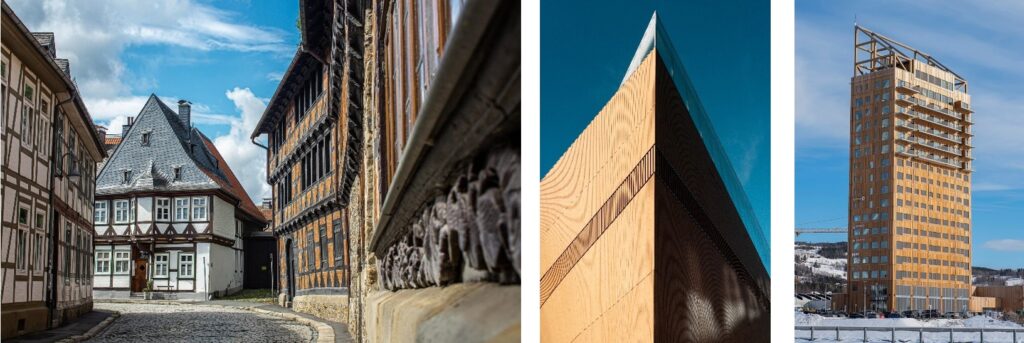 three buildings made of wood and a blue sky in the background