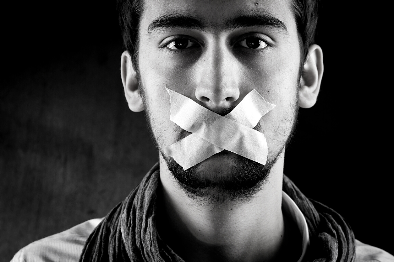 Photo of man silenced by tape